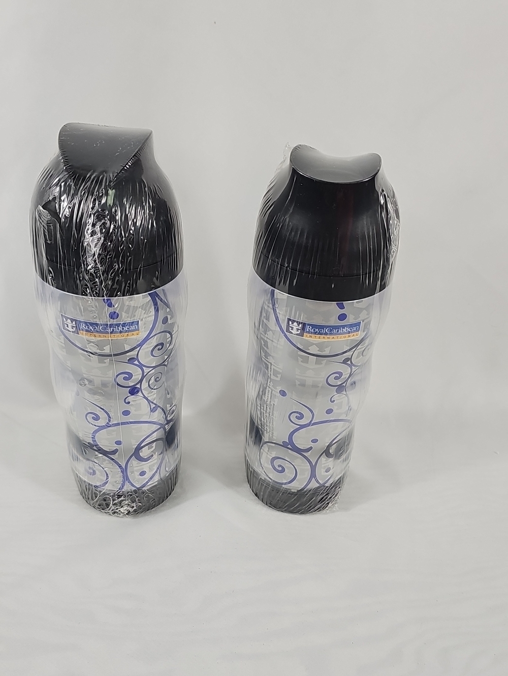 2 Royal Caribbean Coca Cola Swirl Travel Bottles with Black Lids